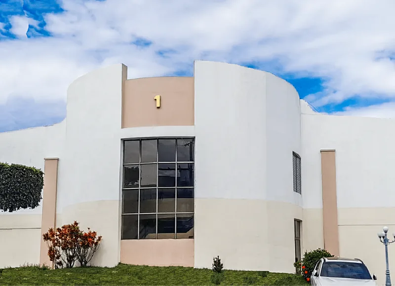Edificio 1, sede de OE Internacional en Santa Tecla